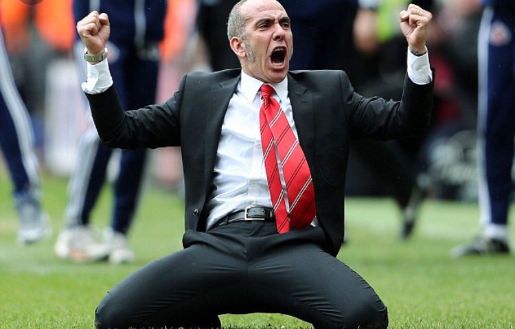 Sunderland manager Paulo Di Canio famously slides on his knees